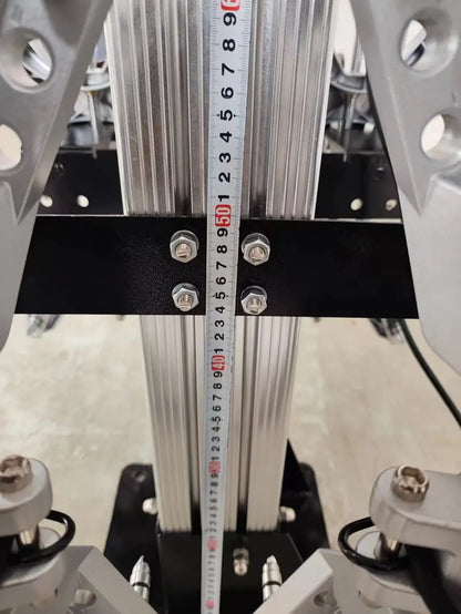 Katool KT-AV6 3D Wheel Alignment Machine closeup showing vertical height adjustment column with measurement ruler and mounting bolts for alignment calibration.