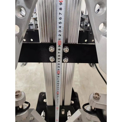 Katool KT-AV9 wheel alignment machine close-up of lifting column with height measurement scale, cross-brace bracket, bolts, and guide rails.