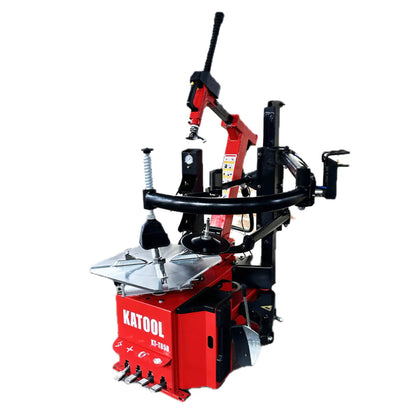 Katool KT-T850 tire changer machine with tilt-arm and wheel clamp, shown in a full front hero view with control pedals and side assist arm