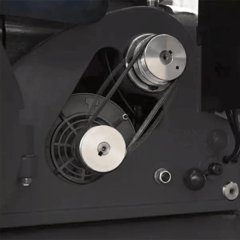 Katool RL-8500 brake lathe internal view showing belt-driven pulley system, dual aluminum wheels, motor housing, and tension adjustment mechanism for smooth spindle operation.