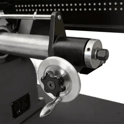 Katool RL-8500 brake lathe closeup showing rear spindle assembly with precision locking handle, silver adjustment wheel, and reinforced mounting bracket for rotor alignment.