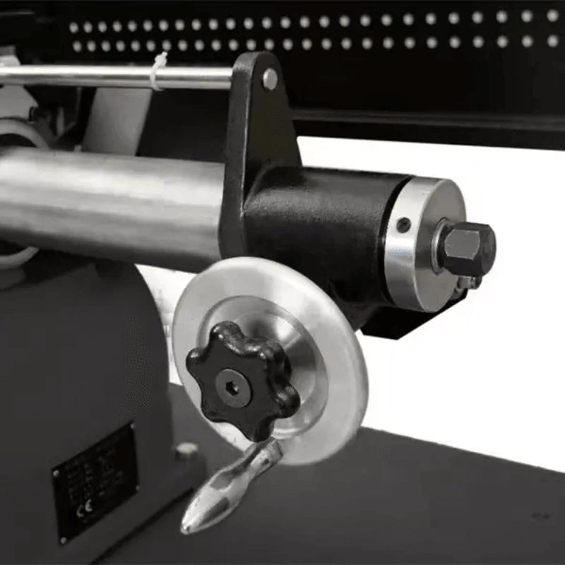 Katool RL-8500 brake lathe closeup showing rear spindle assembly with precision locking handle, silver adjustment wheel, and reinforced mounting bracket for rotor alignment.