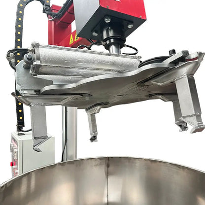 Katool RPM-80 Rim Polishing Machine close-up of assist arm mechanism above polishing drum with mounted cylinder and support structure