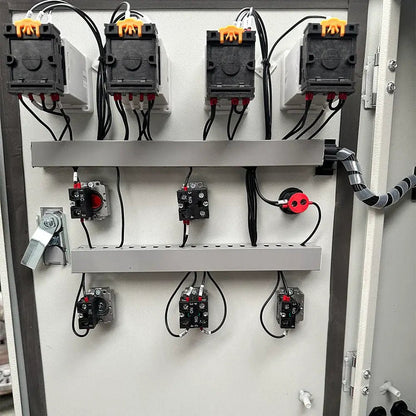 Katool RPM-80 Rim Polishing Machine internal electrical cabinet view showing breakers, switches, and wiring layout for machine operation