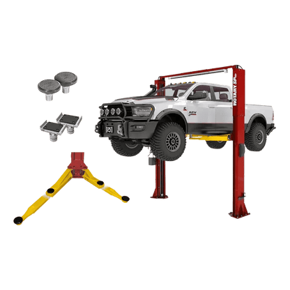 Red and yellow Rotary SPO12-AV lift elevating white pickup with seismic plate