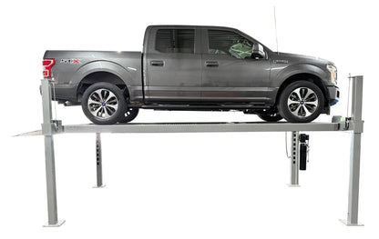 Ford F-150 stored elevated on Triumph NOS10000 four post lift, side profile